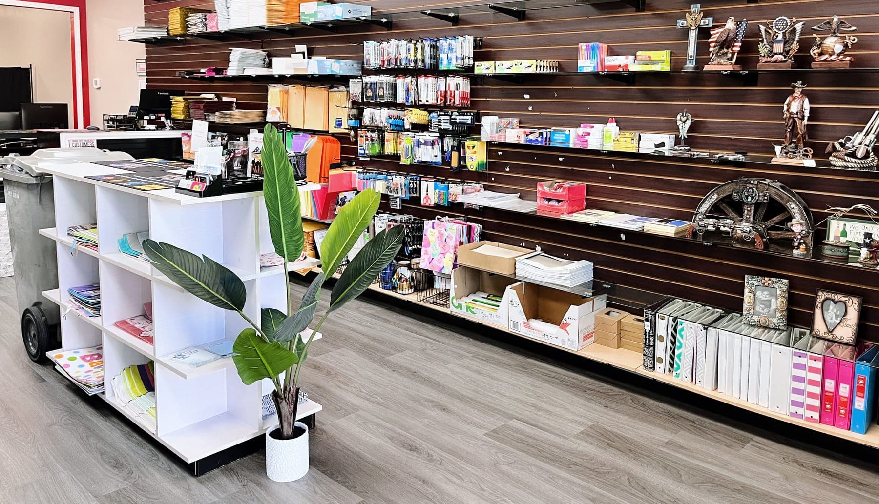 The retail wall of mailers, envelopes, office supplies and gifts inside the store